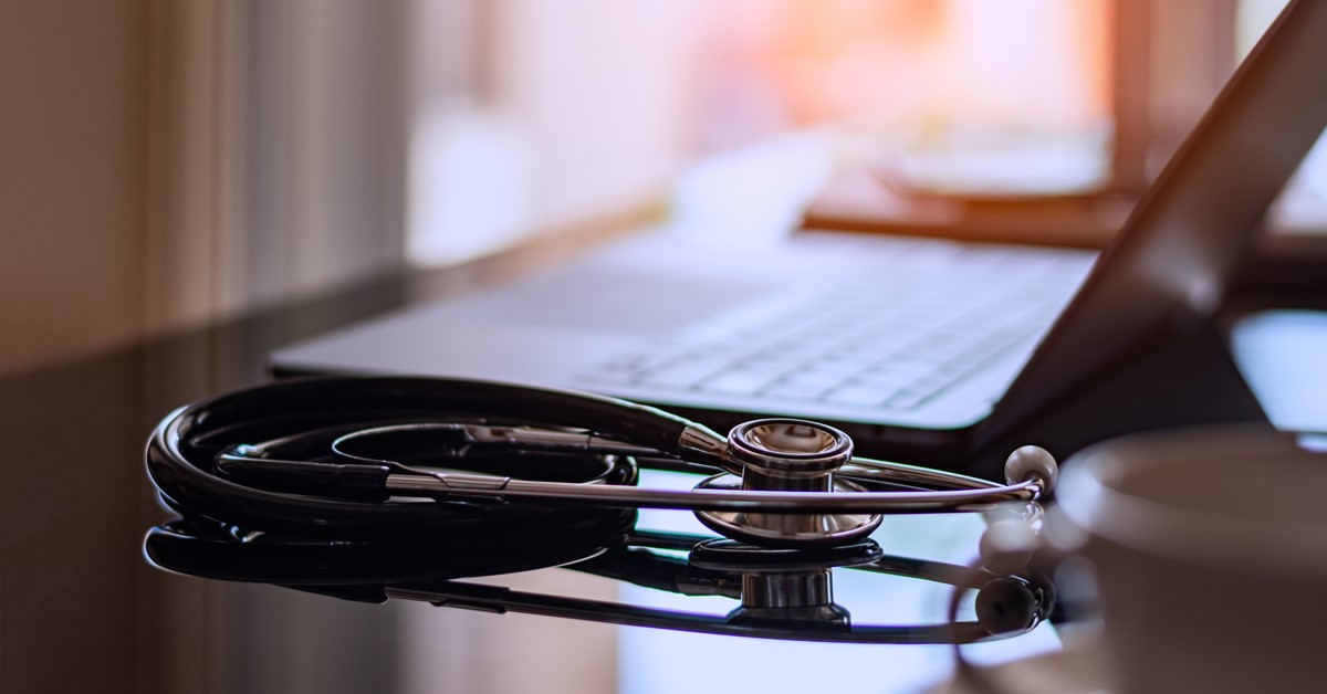 Laptop and stethoscope for healthcare