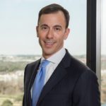 Jonathan Lass with Jackson Walker logo