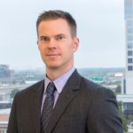 John Jackson with Jackson Walker logo