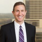 Noah Galton with Jackson Walker logo