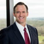 Mike Nasi with Jackson Walker logo