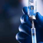 Vaccination medical syringe with Jackson Walker logo