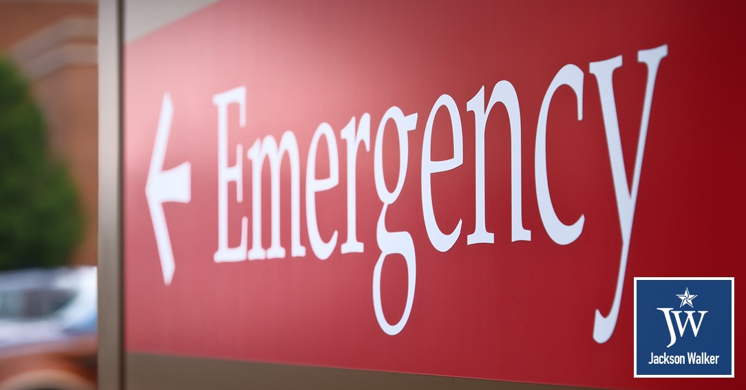 Hospital emergency sign with Jackson Walker logo