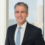 Mike Held with Jackson Walker logo