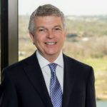 Steve Moore with Jackson Walker logo