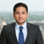 Wasif Qureshi with Jackson Walker logo