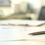 Finance tax form paper with Jackson Walker logo