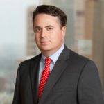 Joe Flack with Jackson Walker logo