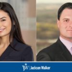 Valery Piedra and Emilio Nicolas with JW logo