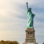 United States Statue of Liberty with Jackson Walker logo