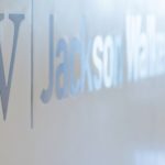 Jackson Walker elevator bank logo