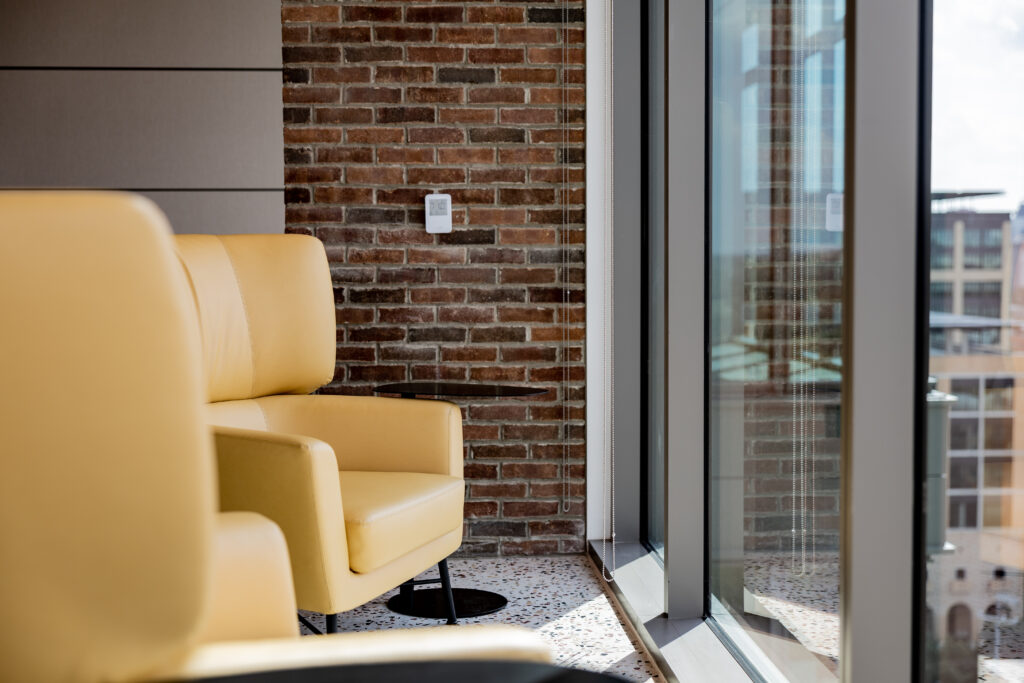 The office includes community spaces including leisure and entertainment zones designed to promote communication and rejuvenation.