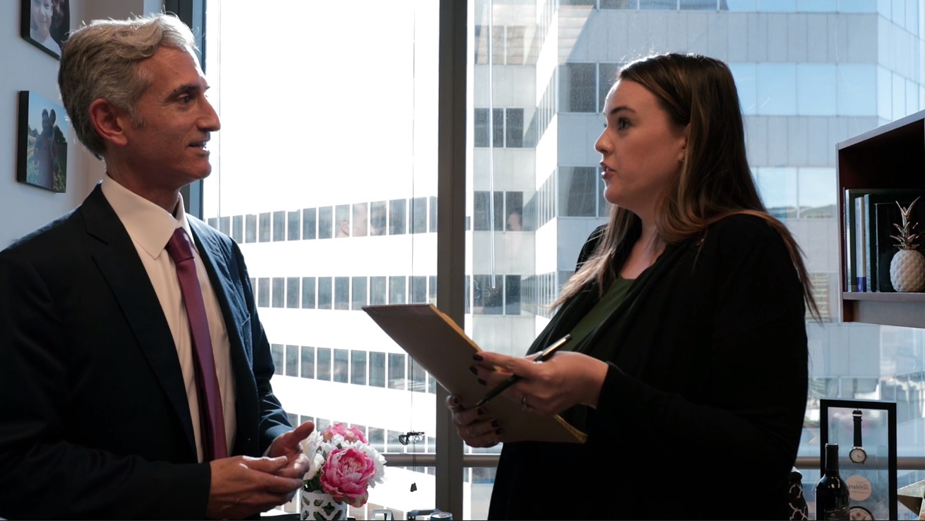 Jackson Walker attorneys discussing a matter
