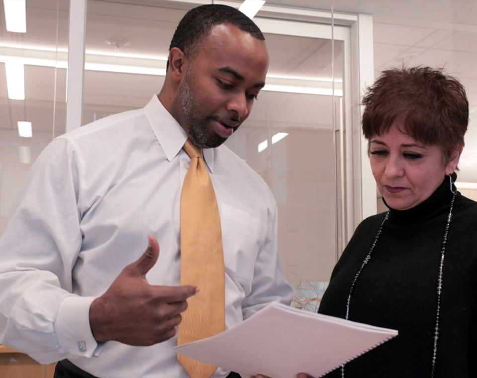 Jackson Walker attorney Nate St. Clair with Yolanda Lopez